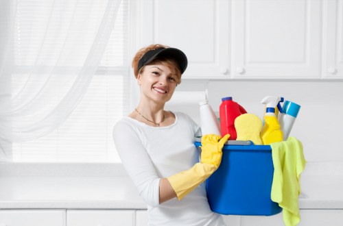 Cleaner completing final safety checks in a professional cleaning environment