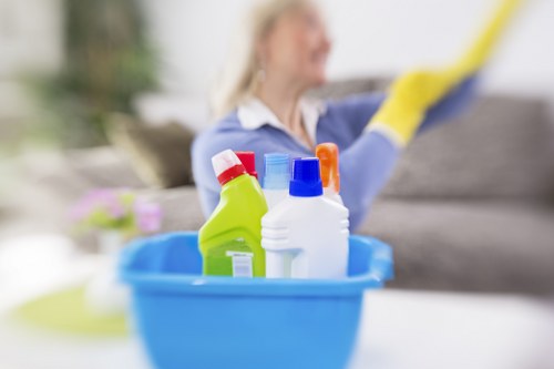 Technician treating a fabric sofa stain carefully
